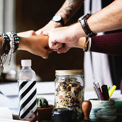 team, hands together